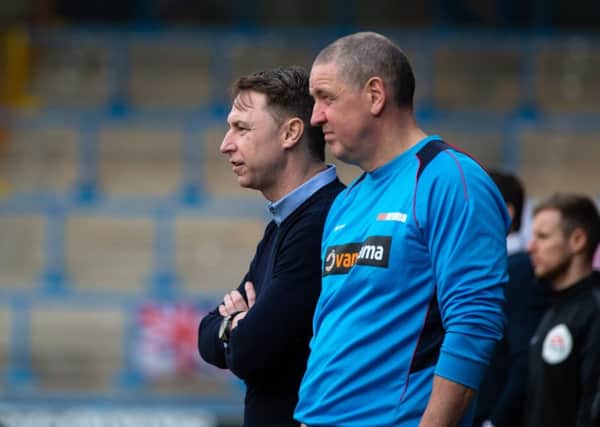 Actions from FC Halifax Town v Havant and Waterlooville, at the Shay. Pictured is Jamie Fullarton and assistant manager Phil Hughes.