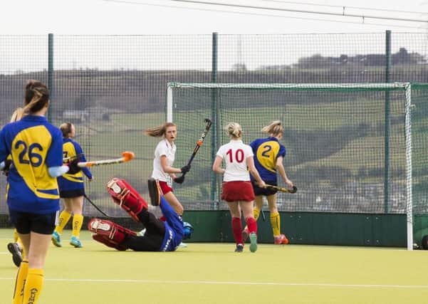 Dani Parker scores one of her three goals against Hull