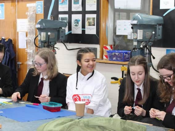 Year 9 girls at Rastrick High School enjoying a STEM lesson delivered by DePuy Synthes