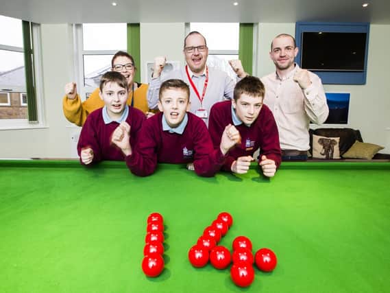 Back, from the left, residential social care worker Charlotte Green, vice principal Damien Talbot and senior residential care worker Tom Forsyth. Front, Zac Priestley, 11, Danny Booth, 12, and Billy-Joe Cook, 13.