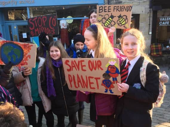 Teens gathered to protest for action on climate change last month.