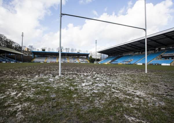 Muddy, waterlogged pitch at The MBI Shay Stadium, Halifax.