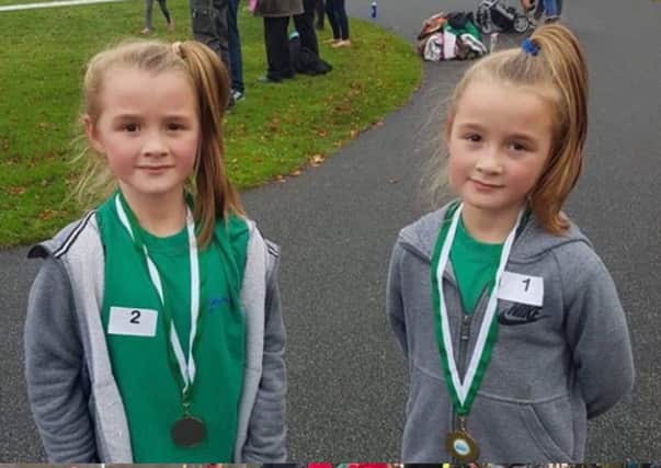 Identical twins Alesha and Lily Atkinson finished first and second  at the West Yorkshire Schools cross country championships.