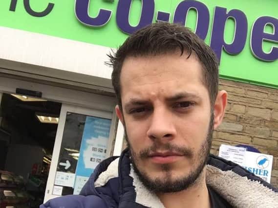 David Edgington, 31, has hit back at critics after he 'stood guard' outside his local Co-op.