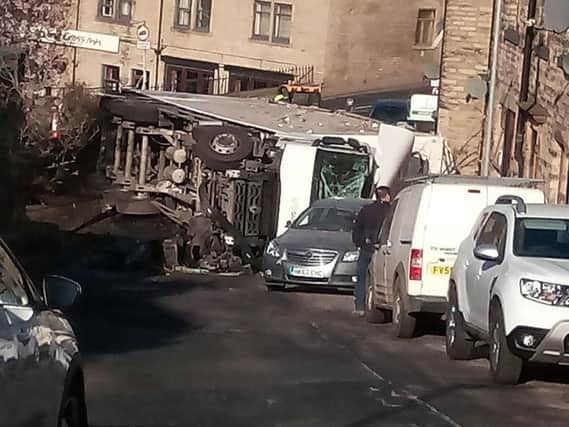 The overturned lorry at Stump Cross