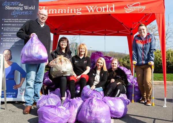 John Wynn, MIchelle Bancroft, Lynn Parker, Bernice Lowry, Shirley Blackburn and Pam Jennion, at the Slimming World Clothes Throw, for Cancer Research UK, at Morrisons, Elland