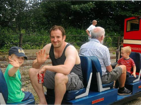 Nick and his son Hadyn on the trains at Ravensprings Park