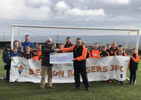 Banking cash: Beacon Rangers Junior Football Club, Withinfields Primary School and St Annes Scout Group.