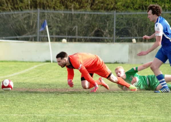 Pontefract Collieries v Brighouse Town
Gabriel Johnson (in green) scores
Picture: Steven Ambler