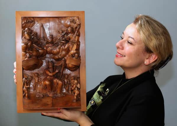 Hannah Phillip, director of Fairfax House with the Grinling Gibbons.
Picture: Richard Doughty Photography