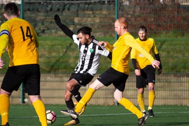 Actions from the game, Panda FC v Waiters Arms, Halifax FA Cup semi-final, at Calderdale College. Pictured is Tariq Pervez and Scott Chegg