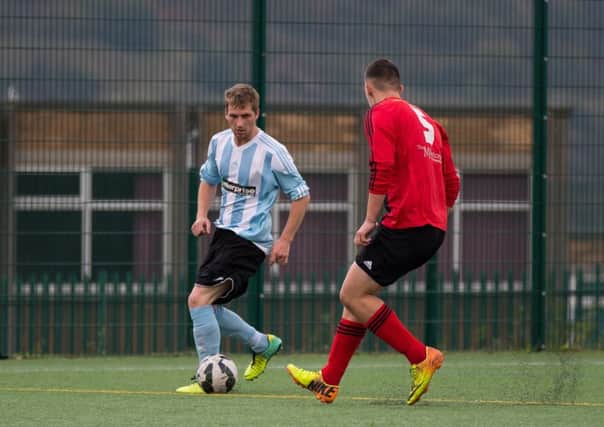 Actions from Waiters Arms v Ryburn United, at Trinity Academy. Pictured are David Chappell and Riorden Forbes