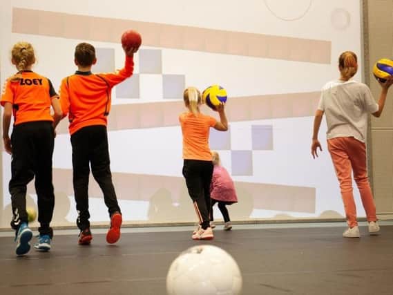 multiBALL enables users to transform wall space into an interactive playground.