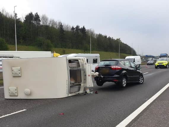 The overturned caravan on the M62 (picture by WYP_TrafficDave)