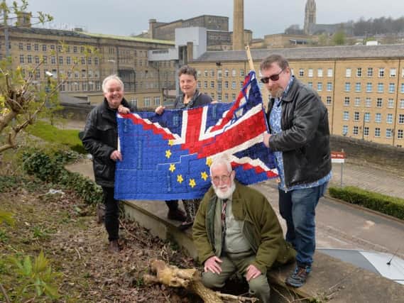 Eexhibition at Dean Clough in Halifax. Called The Brexit Show, features 30 artists'  work reflecting how they feel about Brexit. Pictured are Dave Pugh, Brian Lewis,  Reini Schuhle and Frank Darnley with The Brexit Comfort Blanket by Jo Bibby.