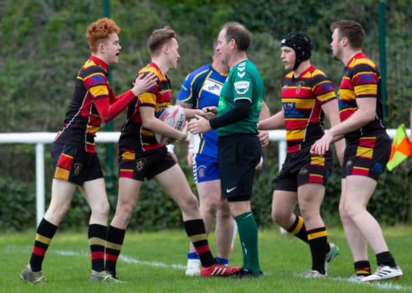 Brighouse celebrate a try for Lewis Taylor