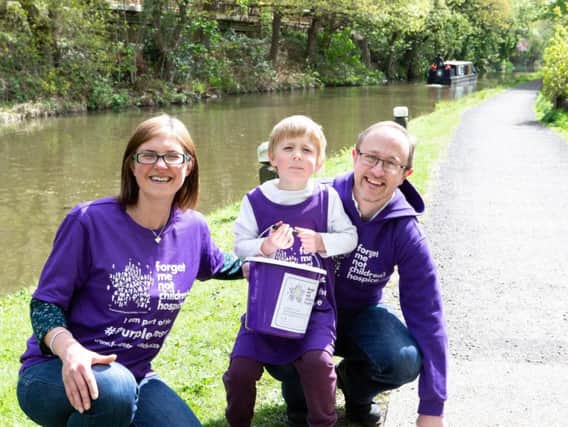 Gabriella, Calvin and Carl Walker, walking from Sowerby Bridge to Hebden Bridge, raising money for the Forget Me Not Childrens Hospice
