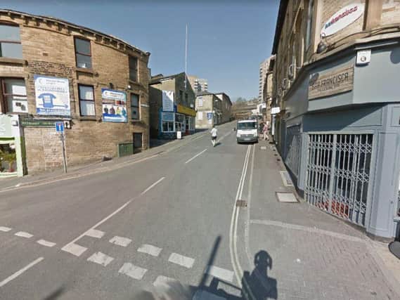Five men have been arrested after armed police found a rifle in Sowerby Bridge, Halifax.