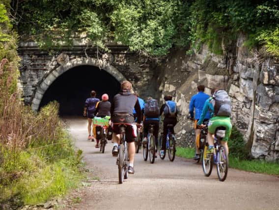 Cyclists at the South portal at Queensbury Tunnel. Photo: Queensbury Tunnel Society