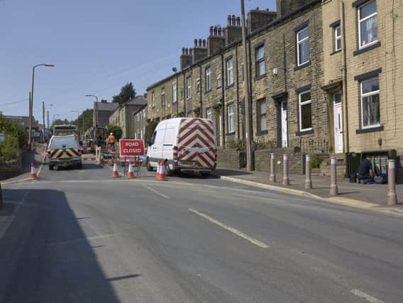 The main road is closed from Claremount Road junction to the junction of Ploughcroft Lane.