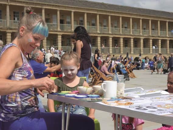 Face painting at a previous event at The Piece Hall