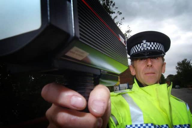 Police officers in Calderdale tackling anti-social and illegal drivers