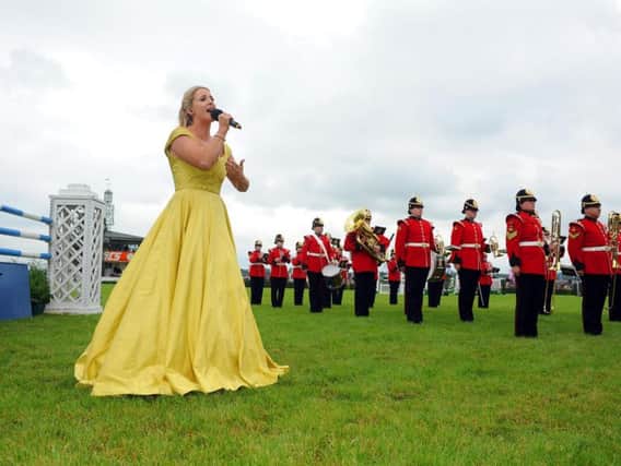 Soprano Lizzie Jones performs in the main ring on the first day of the Great Yorkshire Show. Picture Tony Johnson.