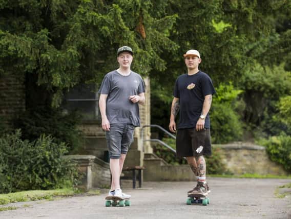 Oliver Izzard, left, and Bradley Power, who skateboarded for 22 miles to raise funds in memory of their friend Tom Frankland.