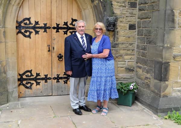 Alan and Chris Knott recreate their wedding photographs at Christ Church in Pellon, Halifax on their 50th anniversary with the help of their daughter Jo. Picture Tony Johnson.