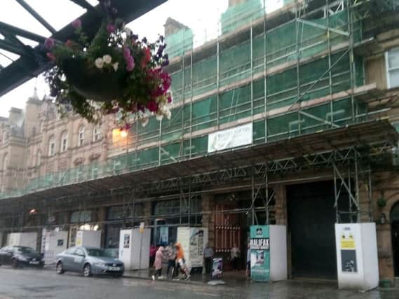 External view of scaffolding at Halifax Borough Market at the Market Street side of the Victorian indoor market in Halifax town centre.