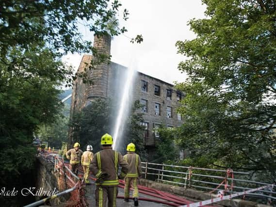 Firefighters tackling the blaze at Walkley Clogs, Mytholmroyd. Photo by Jade Kilbride