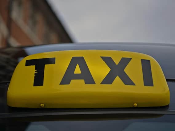 A Calderdale taxi driver has appearing in court