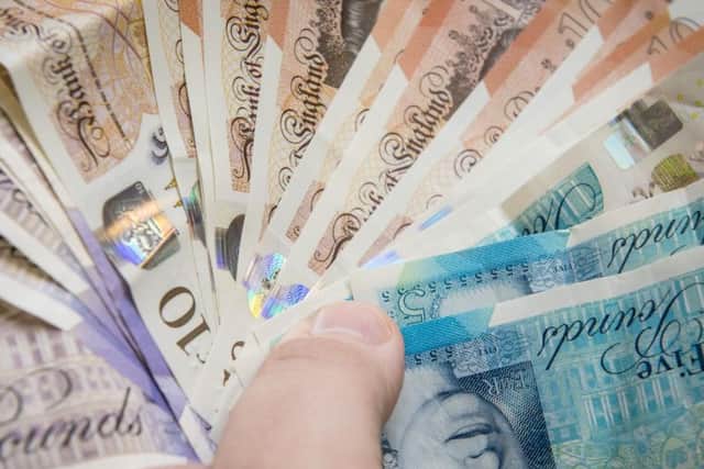 A Brighouse woman has been sentenced at Bradford Crown Court for taking money from a vulnerable Calderdale resident