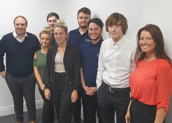 Growth Key: MD James Howard (left) and HR director Vikki Oakley (right) with some of the apprentices.
