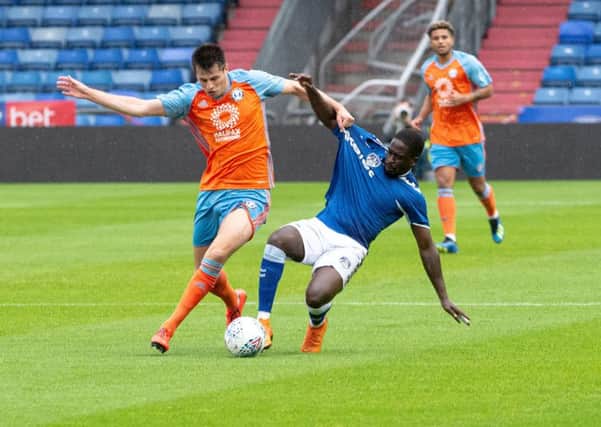 Liam Nolan in action for Halifax during their 1-0 pre-season win at Oldham. Photo: Ian Charles