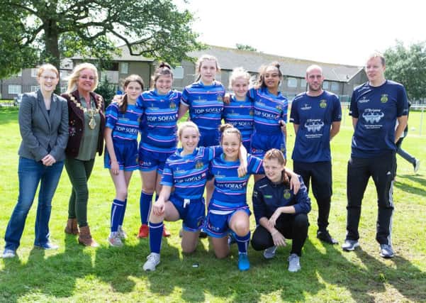 Deputy mayor Angie Gallagher and MP Holly Lynch, with the girls under 14 rugby team, at the official opening of the renovated rugby pitch, at Illingworth Sports Club, Halifax