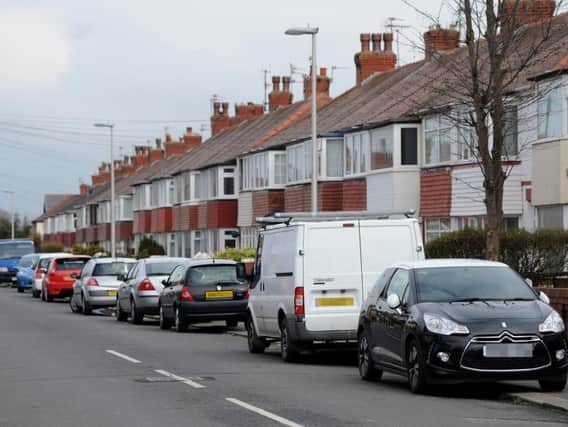 MPs are calling of a nationwide ban on cars parking on pavements