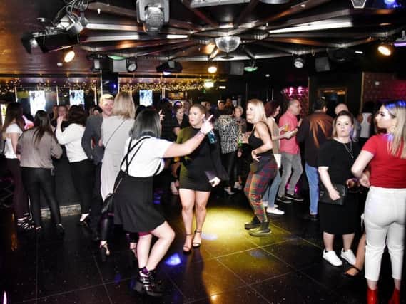 Stock picture of dancers in a nightclub