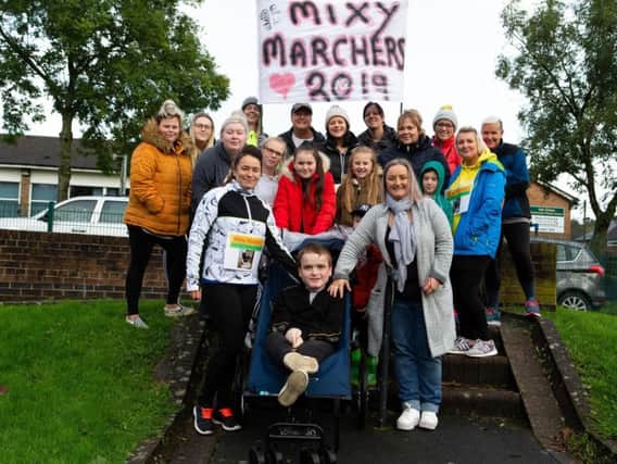 Archie with his mum Patsy, Beverley and the Mixy Marchers.