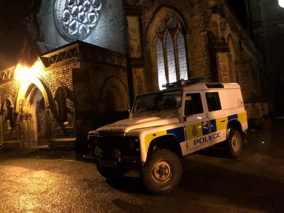 Picture submitted by Todmorden Unitarian Church of police outside the building