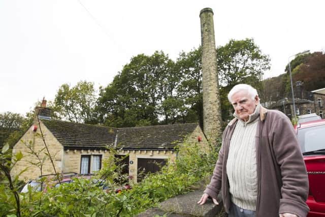 Ralph Cooper has called the decision to demolition the Hebden Bridge chimney 'a disgrace'.