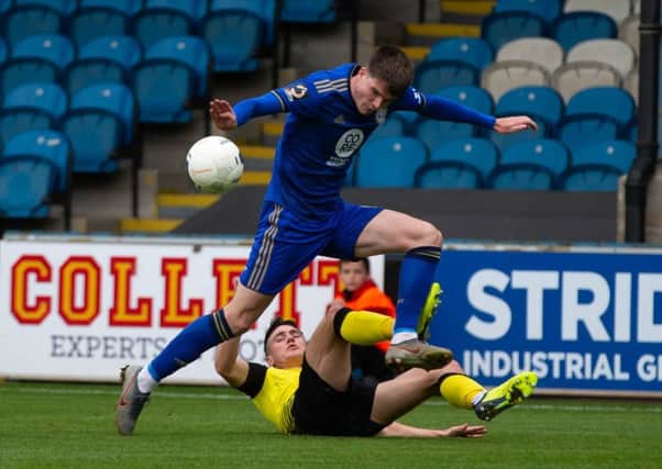 Actions from FC Halifax Town v Harrogate Town, FA Cup match at the Shay. Pictured is Liam McAlinden