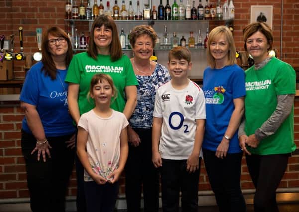 Deb Meek, Alison Moore, Janette Clark, Paula Ward, Ros Craven, Olivia Moore and Sam Moore, at the Venue Barkisland. Alison Moore is doing 20 fundraising events to mark 20 years since her brother and dad passed away