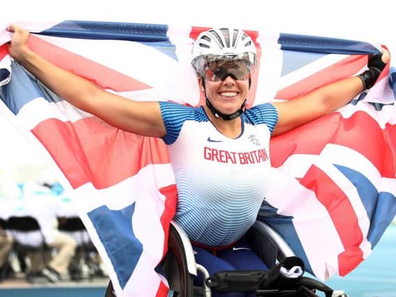 Hannah Cockcroft of Great Britain celebrates winning the Women's 100m T34 final on Day Four of the IPC World Para Athletics Championships 2019 (Photo by Bryn Lennon/Getty Images)