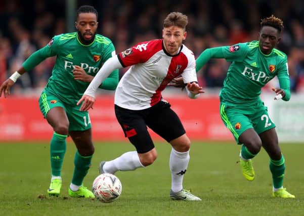 Woking's Jake Hyde (centre). Photo: Getty Images