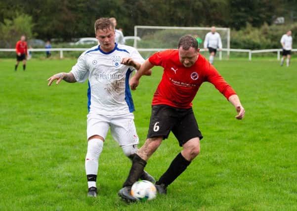 Actions from Old Post Office FC Reds v Clifton Rangers Athletic, at West Vale. Pictured is Darrell Camp and Tom Hill