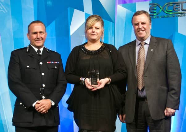 Temporary Chief Constable John Parkinson, PC Lisa McDonald and West Yorkshire Police and Crime Commission Mark Burns- Williamson.