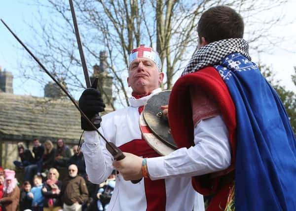 Heptonstall Pace Egg Play. 
Stuart Hought as St George, left, and Rowan Carter as Bold Hector.