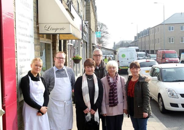 Local residents and shopkeepers angry about proposed Tesco store in the village. Pictured are Felicity Rankin, William Rankin, Amanda Worsfold, coun Colin Raistrick, Geraldine Berry and Gemma McLenahan.