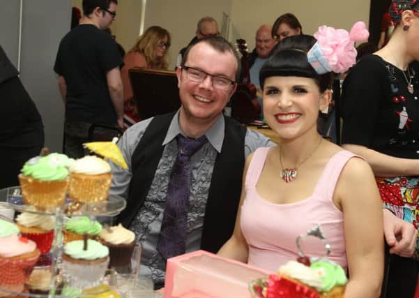 Rob and Alex McCann with the cup cakes Hebden Bridge Burlesque Festival in the town hall.